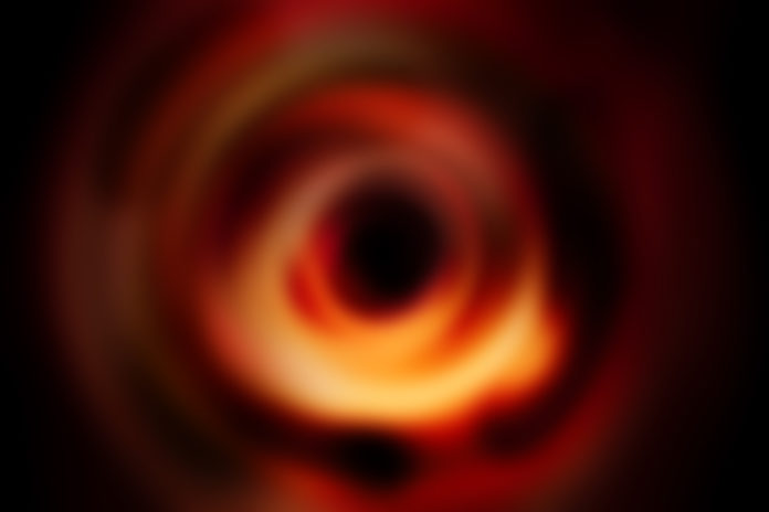 Katie Bouman Unveils The First Ever Black Hole Image With Her